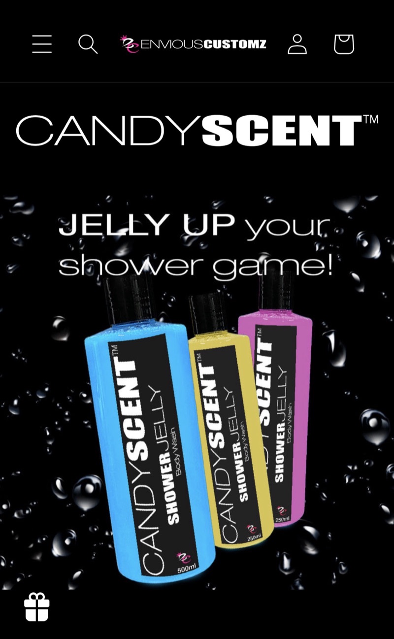 CandyScent website shown on a phone: bold black e-commerce layout with blue, yellow and pink Shower Jelly body wash bottles